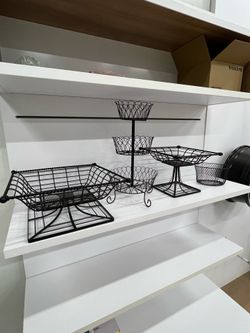 vintage-style black wrought iron stacking pedestal fruit baskets