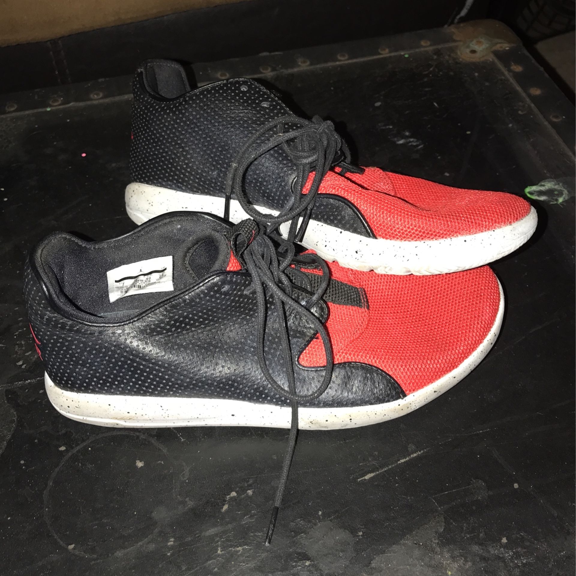 Woman’s Low Rise Red And Black Jordans