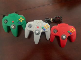 3 Nintendo 64 controllers