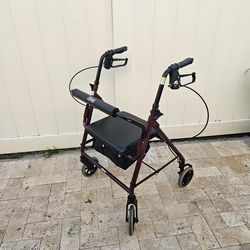 Walker with seat on wheels