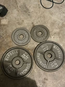 90 Lb Standard Cast Iron Weight plates (2) 35 lb  (2) 10 Lb