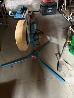Jug softball pitching machine
