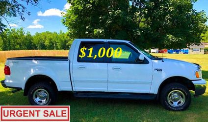 🟢💲1,OOO I am selling my clean title 2OO2 Ford F-150 XLT runs great no issues Cold AC POWER STEERING CRUISE CONTROL 🟢