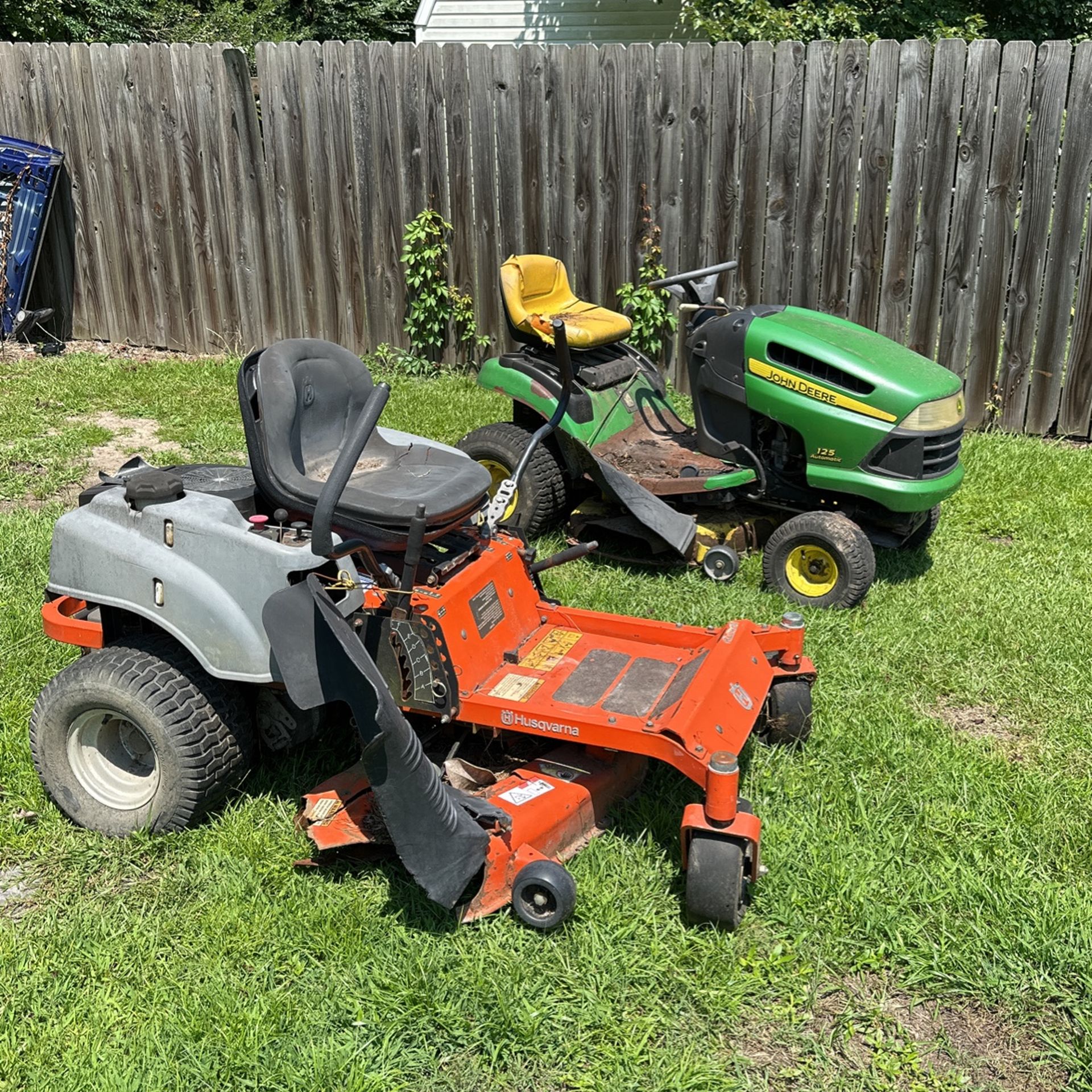 Husqvarna Zero Turn And John Deere Riding Mower