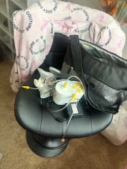 Medela breast pump and parts and storage container