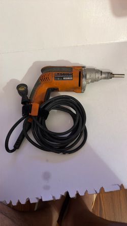 Ridgid R6000 corded sheetrock drill.