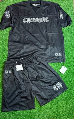 Chrome Hearts Mesh Stadium Football Jersey set in black features branded graphic lettering on the front and matching shorts.