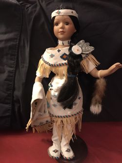Lovely native American porcelain doll