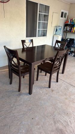 Wooden Dining Tables and 4 chairs