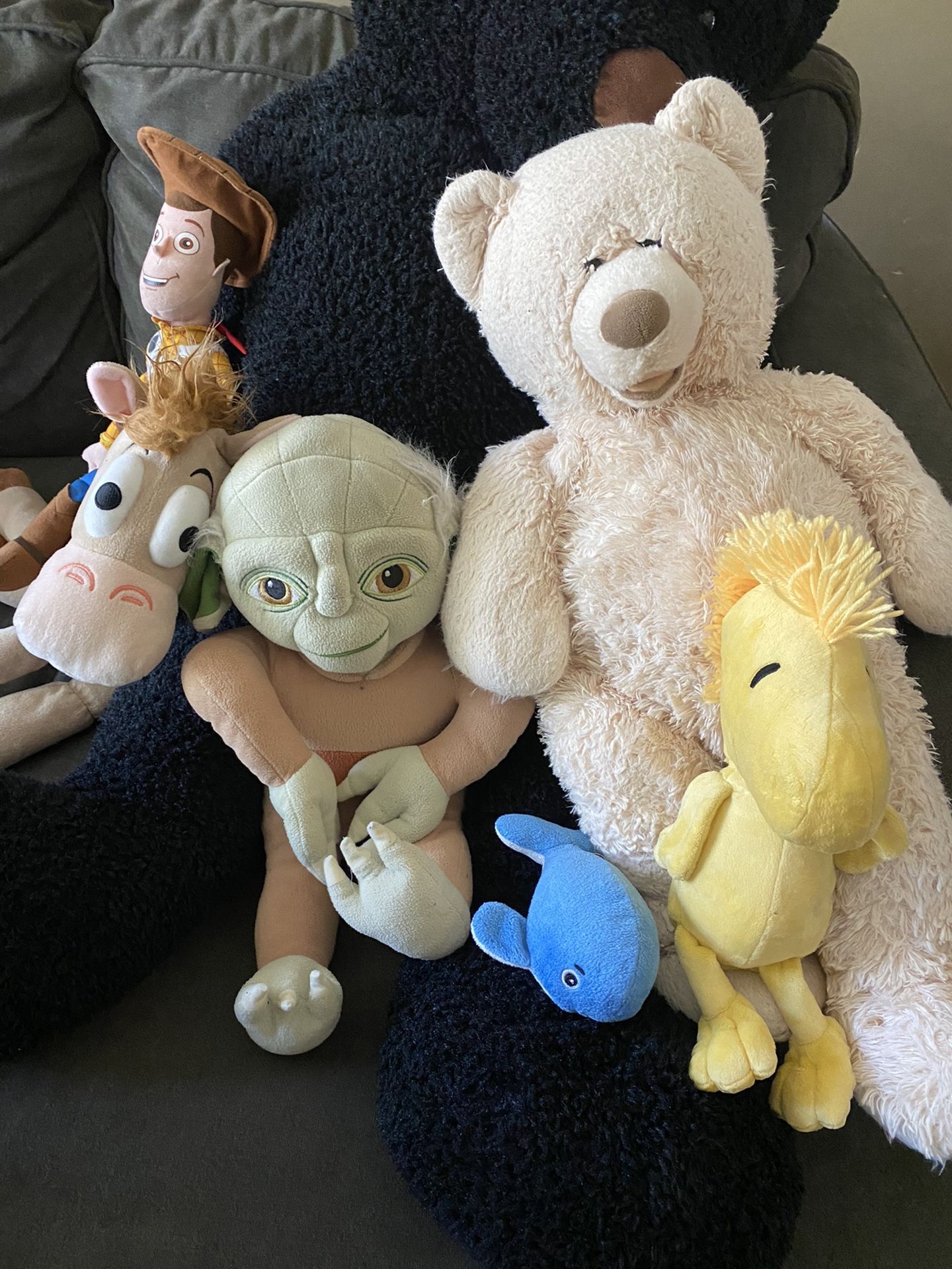 Stuffed animals: toy story woody and bullseye, yoda, peanuts