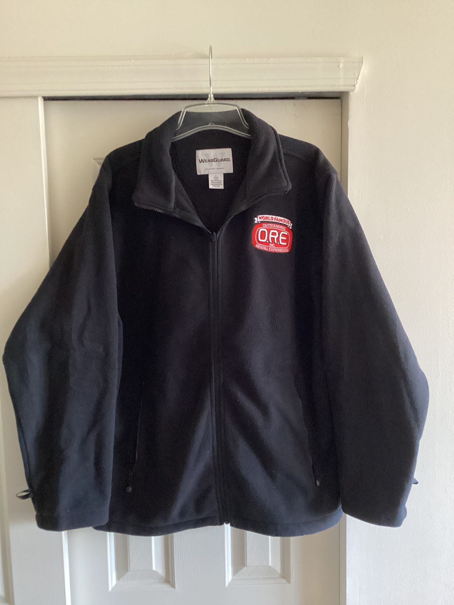 Men’s WearGuard Fleece Jacket, large, black, 32” overall length, zippered front, zippered pockets, company logo, new