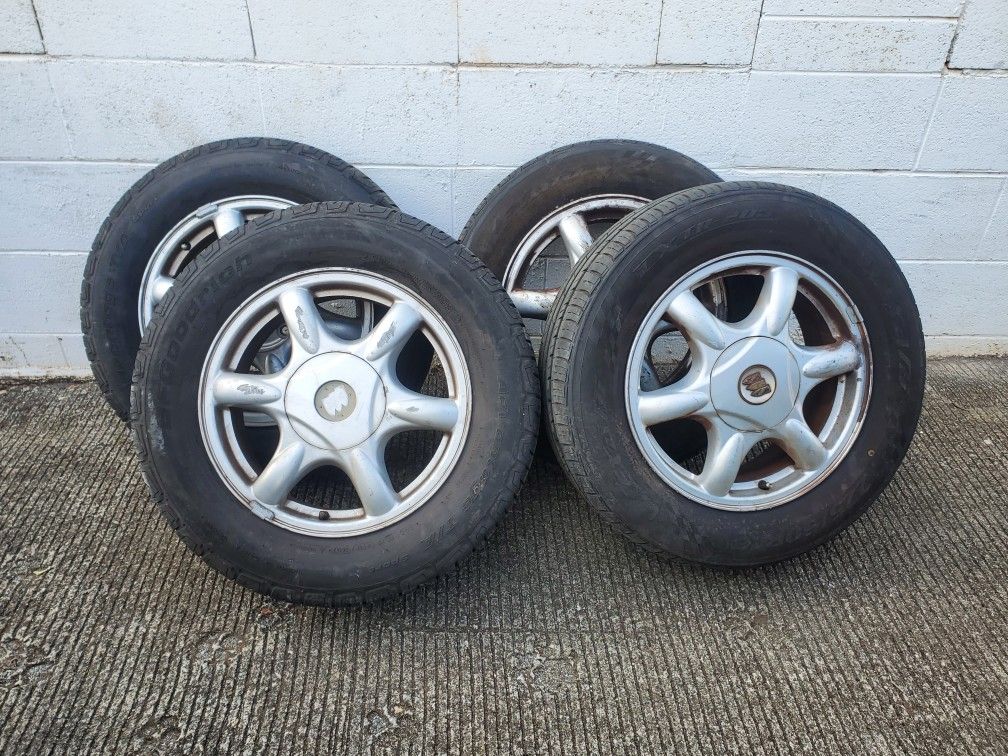 2003 Buick Century rims and tires 225/60R16