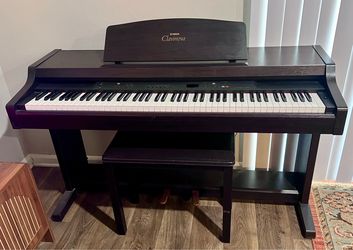 Yamaha Clavinova CLP-820S digital piano –  Dark finish with matching bench 88 Keys