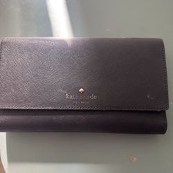 Used Black Kate Spade Wallet! Few Marks On It But Still In Good Condition 
