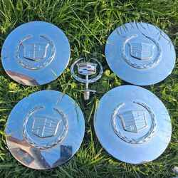 Cadillac hood ornament and hubcap covers