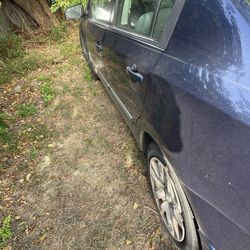 2010 Blue Nissan Sentra 