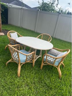 Vintage Rattan Patio Dining Set – Table + 4 rolling Chairs with Cushions