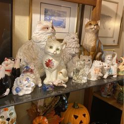 Cat collection of figurines. See all pictures. Various prices. Inquire if interested in an item.