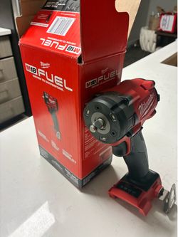 Milwaukee  FUEL 3/8 impact wrench , and M18 RedLithium battery