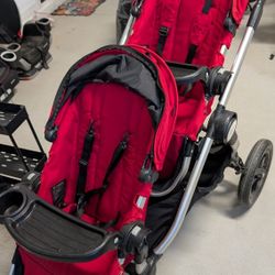Red baby jogger city select double stroller