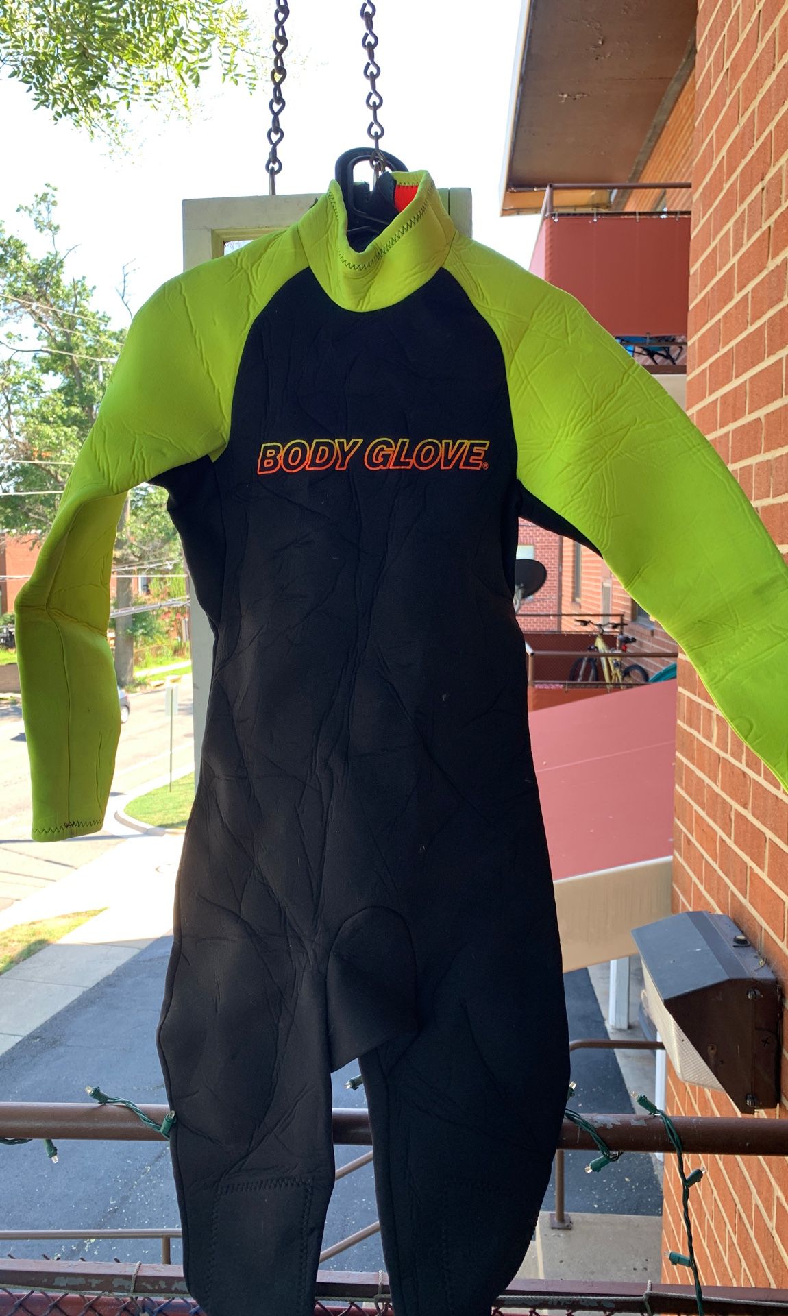 Body Glove - men’s medium wetsuit. Original owner since the late 80s. Barely used. Neon is solid. Boxed away for years.