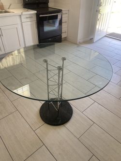 Round glass table, $50
