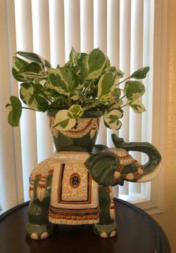 Ceramic elephant plant stand