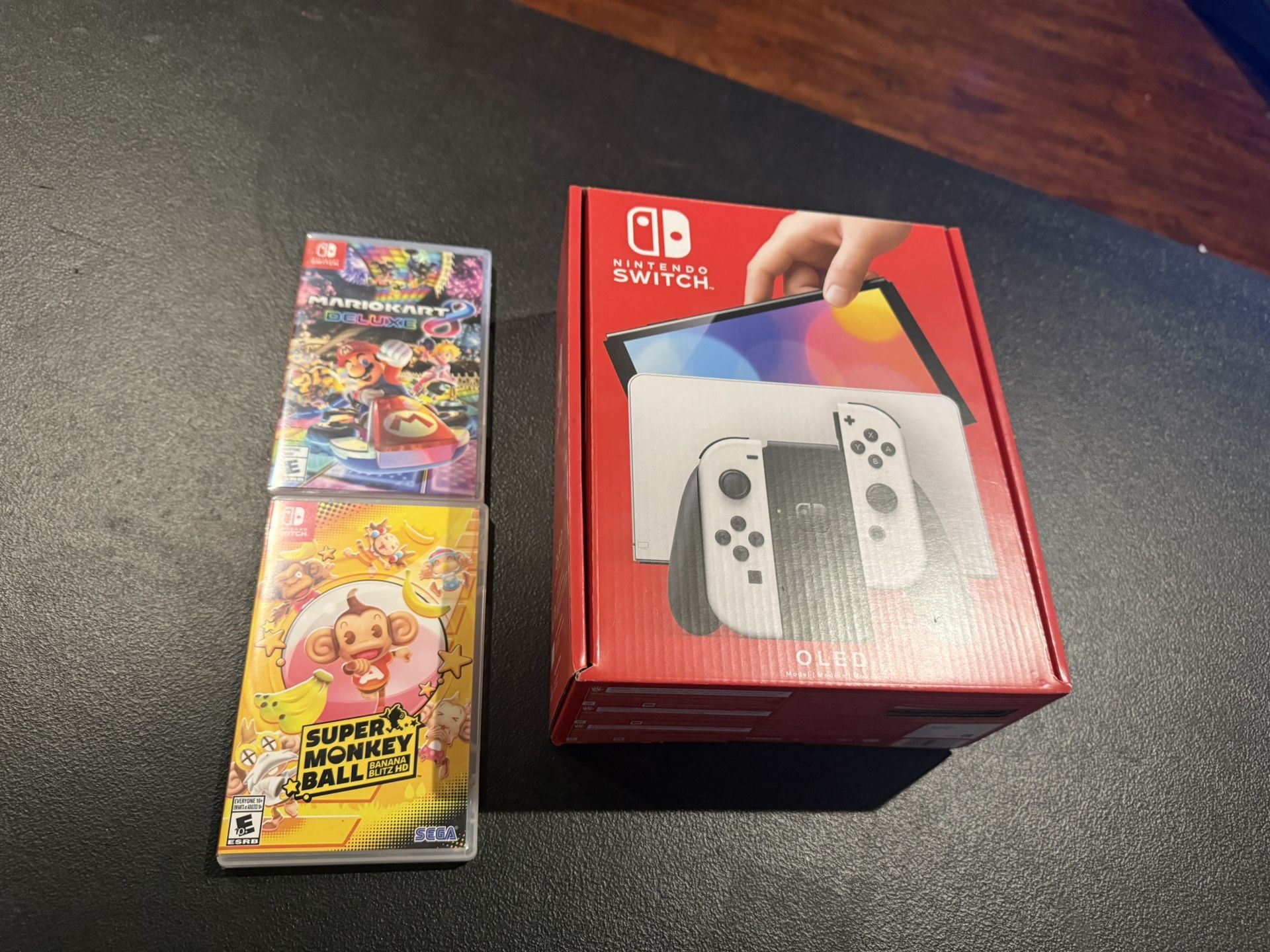 Nintendo Switch OLED Model HEG-001 Handheld Console 64GB White W/ Mario Kart 8 & super monkey Ball   Nintendo Switch OLED Console 64GB -White in Excel