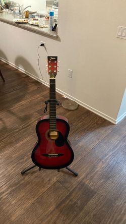 Johnson guitar with stand