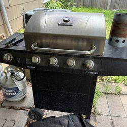 Gas Grill And Propane Tanks 