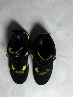 Black and yellow Jordan’s