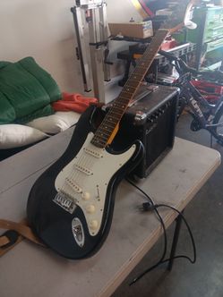 Electric guitar and amplifier