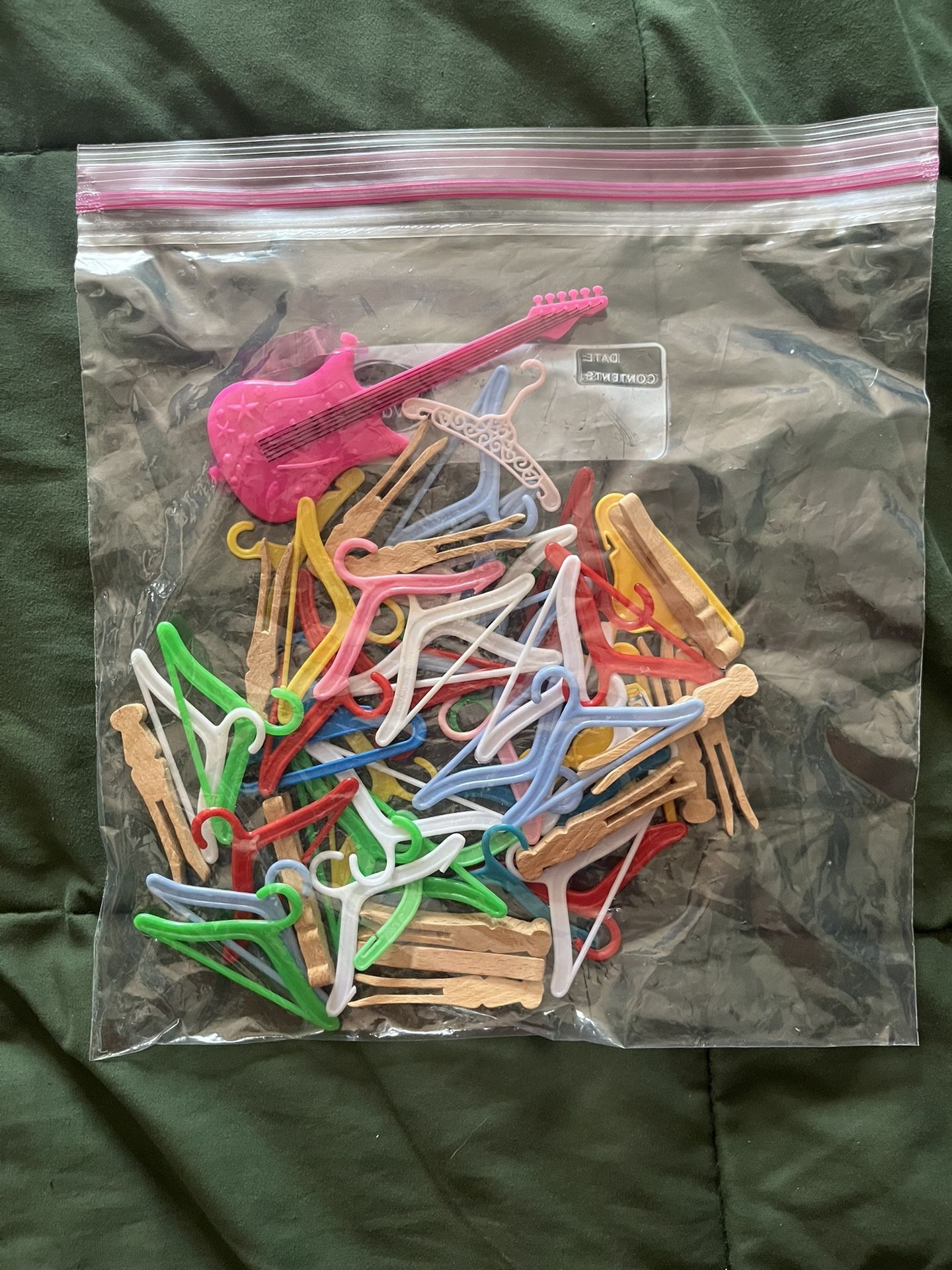Barbie Doll Clothes Hangers and a Barbie Guitar.