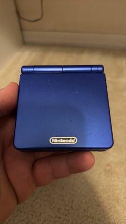 Game boy advanced SP with Super Mario 3