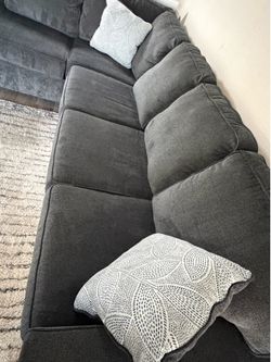 Charcoal grey couch LIKE NEW , less than 2 years old