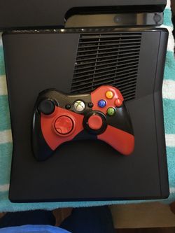Xbox 360 slim with wireless controller and 120 gig hard drive