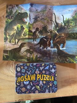 Dinosaur puzzle in metal tin