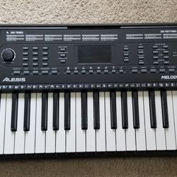 Alesis melody 54 electric keyboard digital piano 54 keys speakers 300 sounds rhythms 40 songs no mic
