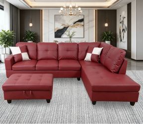 Red leather sectional couch and ottoman