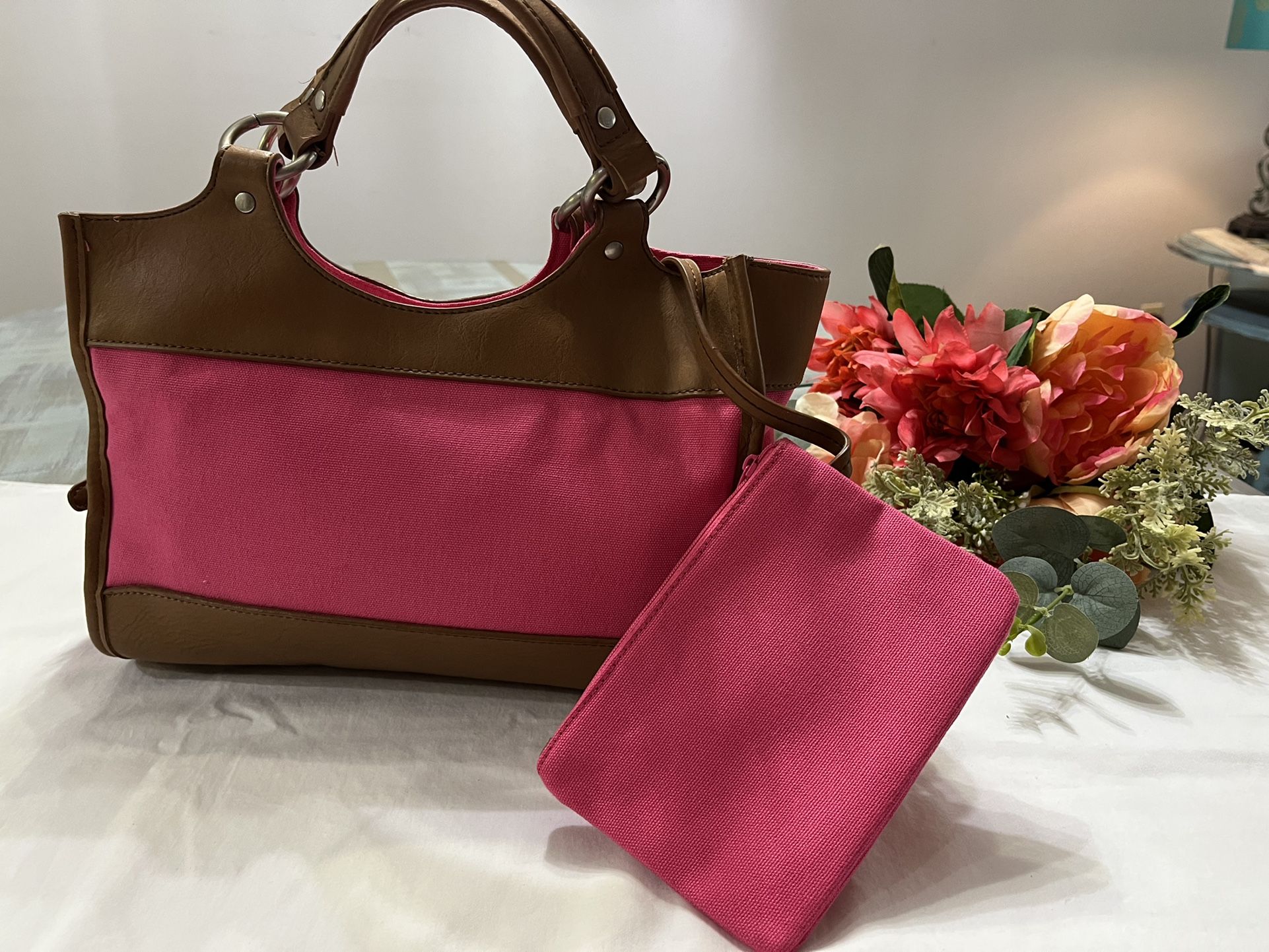 COLDWATER CREEK Women’s Handbag Pink Brown Canvas  This designer bag measures  8 x 13” with an 8 inch double strap. It is pink and faux leather. Easy 