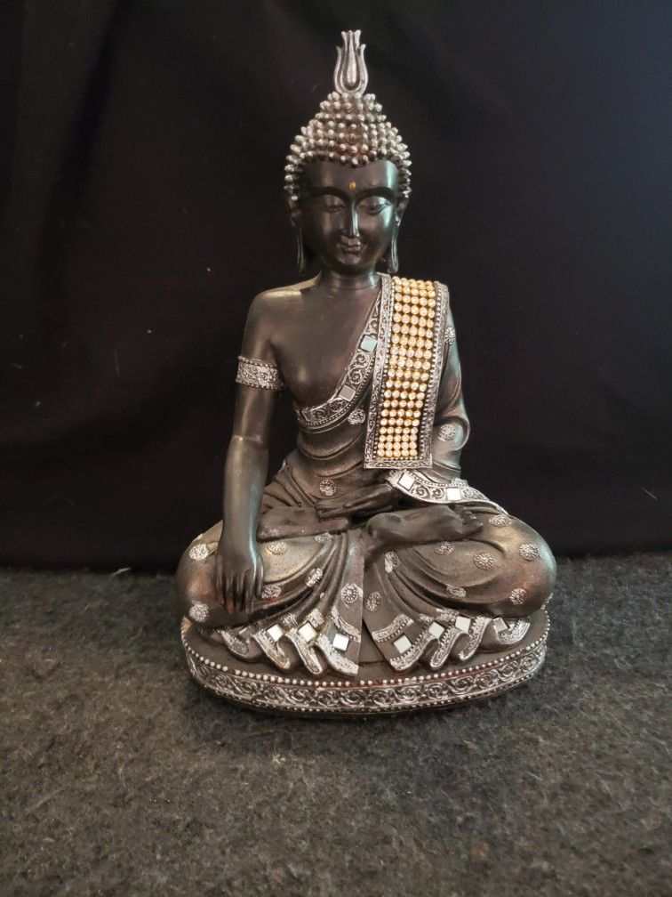 Buddha in the Earth Touching Gesture or Bhumisparsha mudra