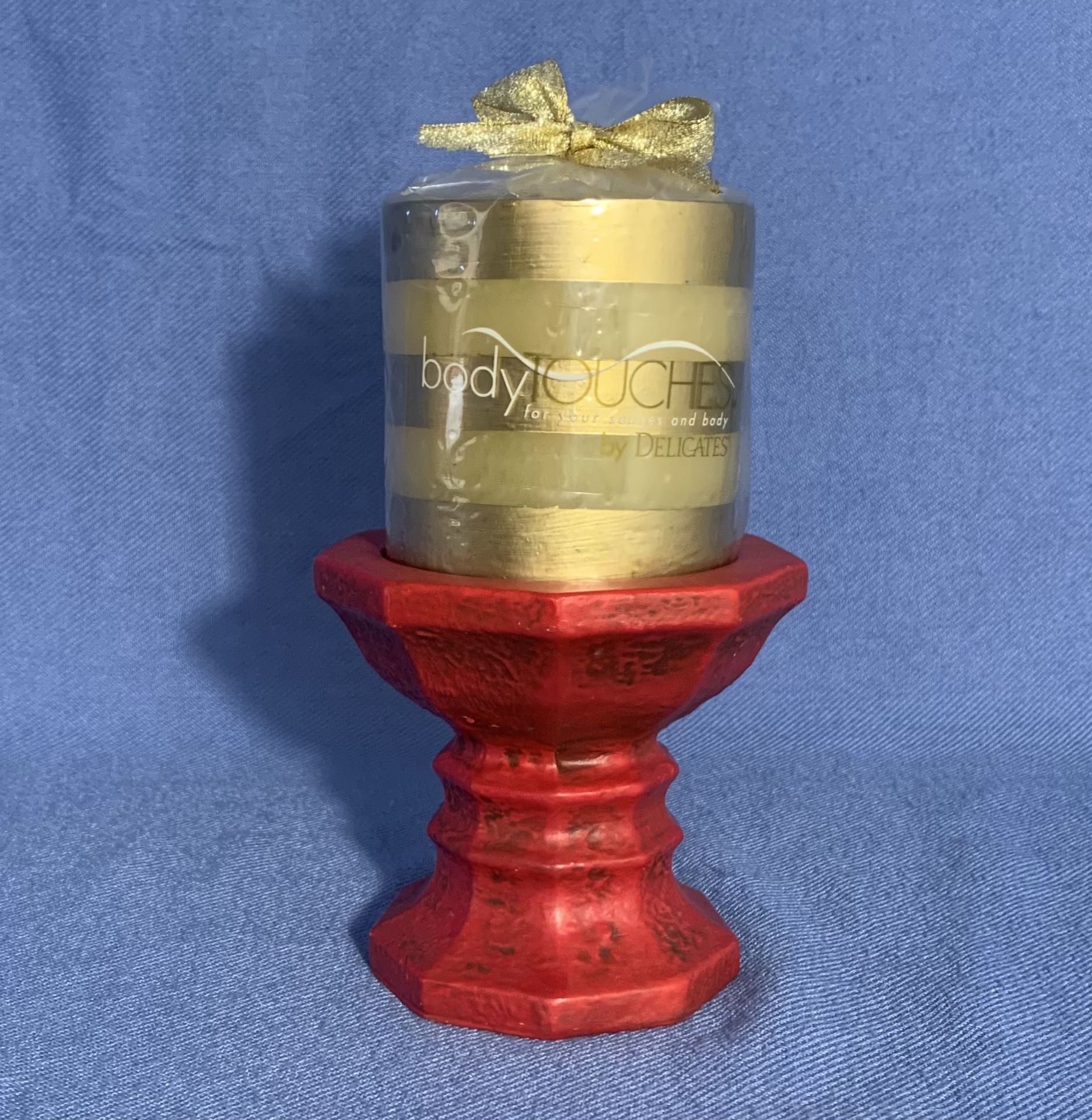 Gold Pillar Candle with Red Holder