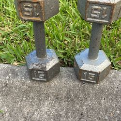 Dumbbells weights set of 15 lbs, metal, used not new, good and strong condition. West Boca 