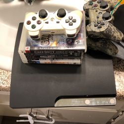 Ps3 With 3 Controllers And Games 