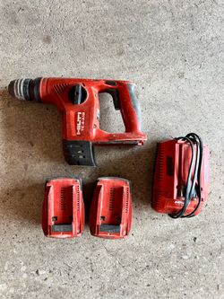 Rotary hammer with charger battery