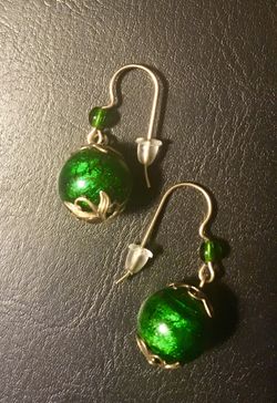 Green orb earrings