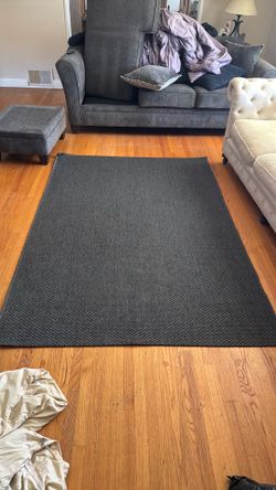 Dark grey Throw rug.