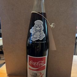 "Coca-Cola " LA Los Angeles "Olympic " Full,sealed 10oz glass bottle with tag  1980/1984
