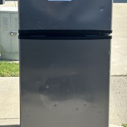 FREE  Full-size fridge/freezer 