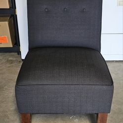 Black armless accent chair